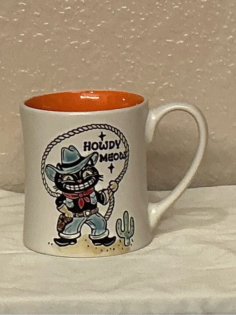 Howdy Meow Embossed Cowboy Cat Ceramic Coffee Mug - Orange Interior. New